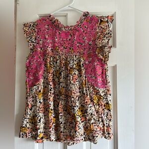 Boutique THML top with tags still on, size medium. Floral with black background.